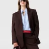 Blazer à revers en pointe et boutonnage simple