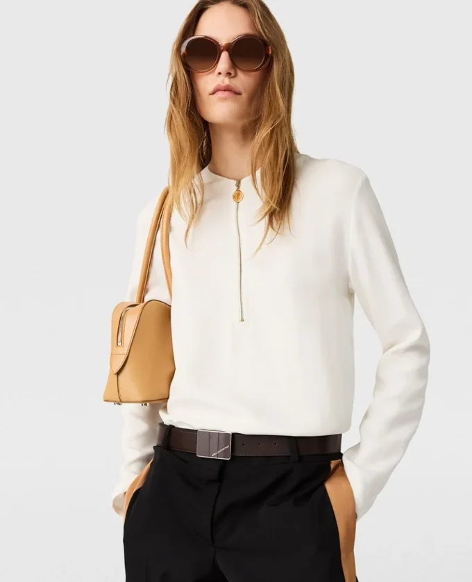 Blouse Arlesa à double ourlet fendu et fermeture éclair Blouse Arlesa à double ourlet fendu et fermeture éclair