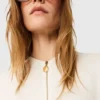 Blouse Arlesa à double ourlet fendu et fermeture éclair Blouse Arlesa à double ourlet fendu et fermeture éclair