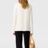 Blouse Arlesa à double ourlet fendu et fermeture éclair Blouse Arlesa à double ourlet fendu et fermeture éclair
