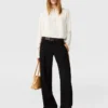 Blouse Arlesa à double ourlet fendu et fermeture éclair Blouse Arlesa à double ourlet fendu et fermeture éclair