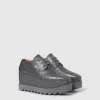 Chaussures à plateforme Elyse Ostrich Chaussures à plateforme Elyse Ostrich