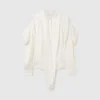Chemise à manches longues avec col cravate et épaulettes Chemise à manches longues avec col cravate et épaulettes