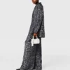 Pantalon oversize à cordon coulissant et imprimé léopard Pantalon oversize à cordon coulissant et imprimé léopard