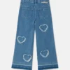 Jean en denim stretch avec patch cœur à franges Jean en denim stretch avec patch cœur à franges