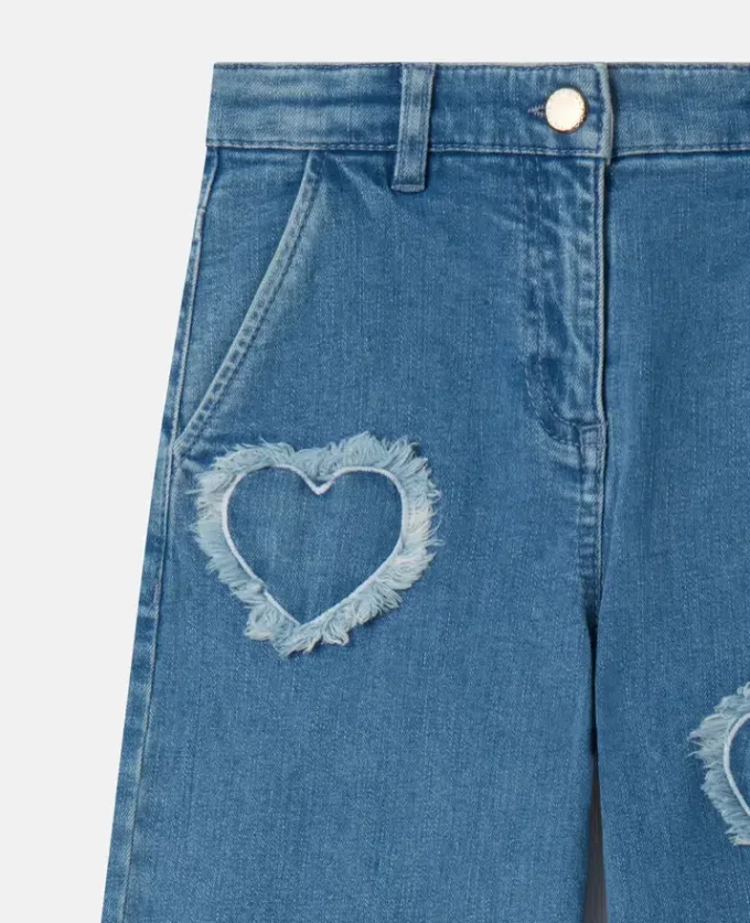 Jean en denim stretch avec patch cœur à franges Jean en denim stretch avec patch cœur à franges