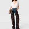 Jeans en denim à empiècements serpent Jeans en denim à empiècements serpent
