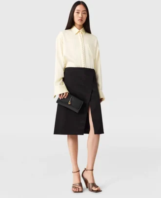 Jupe midi en satin ajustée