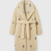 Manteau en peluche orné de cristaux Manteau en peluche orné de cristaux