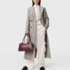 Manteau long en tweed à double boutonnage Manteau long en tweed à double boutonnage