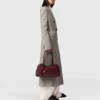 Manteau long en tweed à double boutonnage Manteau long en tweed à double boutonnage