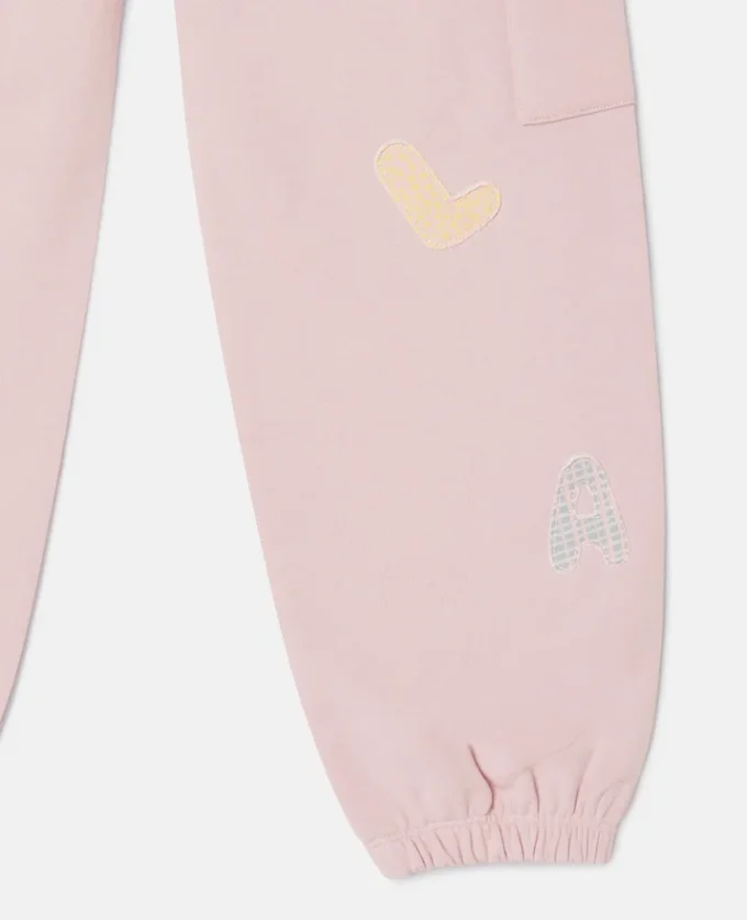 Pantalon de survêtement à cordon coulissant et logo brodé Pantalon de survêtement à cordon coulissant et logo brodé