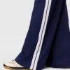 Pantalon de survêtement à double bande et taille élastiquée Pantalon de survêtement à double bande et taille élastiquée