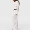 Pantalon droit à plis imprimé serpent Pantalon droit à plis imprimé serpent
