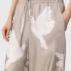 Pantalon oversize à cordon coulissant et imprimé colombes Pantalon oversize à cordon coulissant et imprimé colombes
