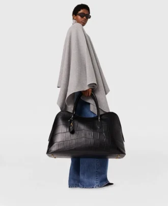 Poncho asymétrique à col roulé en maille