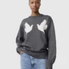 Pull à col rond avec appliqué colombe