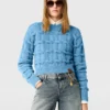 Pull à col rond et torsades Falabella