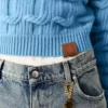 Pull à col rond et torsades Falabella