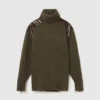 Pull à col roulé et empiècement serpent