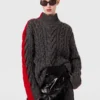 Pull à col roulé et manches lacées en maille torsadée