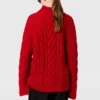 Pull à col roulé et manches lacées en maille torsadée