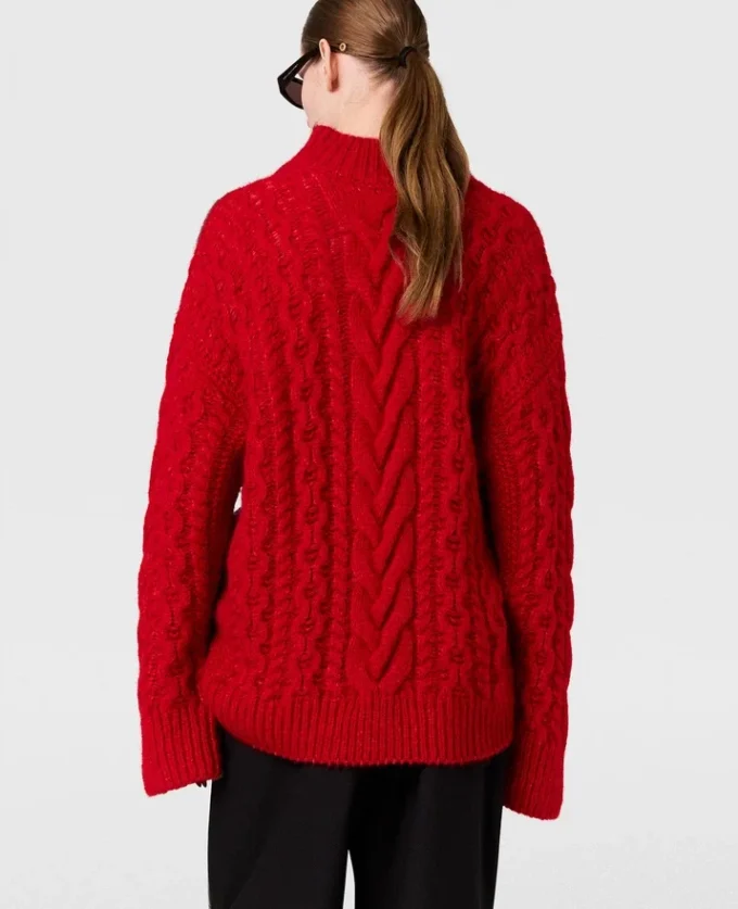 Pull à col roulé et manches lacées en maille torsadée