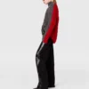 Pull à col roulé et manches lacées en maille torsadée