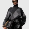 Pull à col roulé et motif argyle