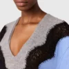 Pull à manches longues et empiècements en dentelle