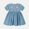 Robe en denim brodée de coccinelles