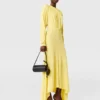 Robe longue à manches longues en jersey plissé Robe longue à manches longues en jersey plissé