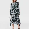 Robe midi à manches longues en maille florale Robe midi à manches longues en maille florale
