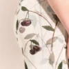 Robe midi sans bretelles en maille imprimée cerises Robe midi sans bretelles en maille imprimée cerises