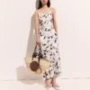 Robe midi sans manches à imprimé cerises Robe midi sans manches à imprimé cerises