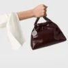 Sac à bandoulière à cordon Falabella en cuir verni Sac à bandoulière à cordon Falabella en cuir verni
