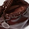 Sac à bandoulière à cordon Falabella en cuir verni Sac à bandoulière à cordon Falabella en cuir verni