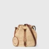 Sac seau Falabella en raphia crocheté Sac seau Falabella en raphia crocheté