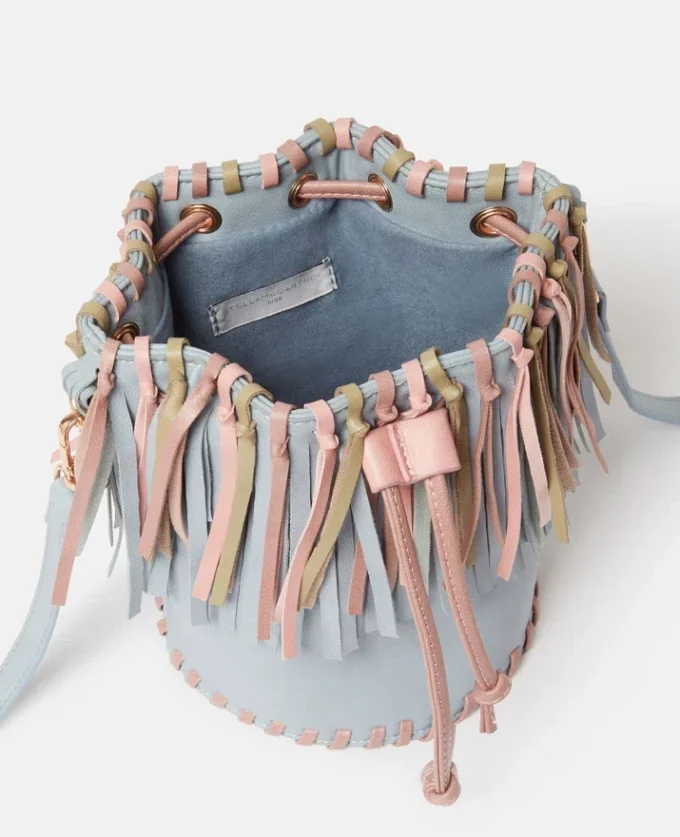 Sac seau à franges et pompons Sac seau à franges et pompons