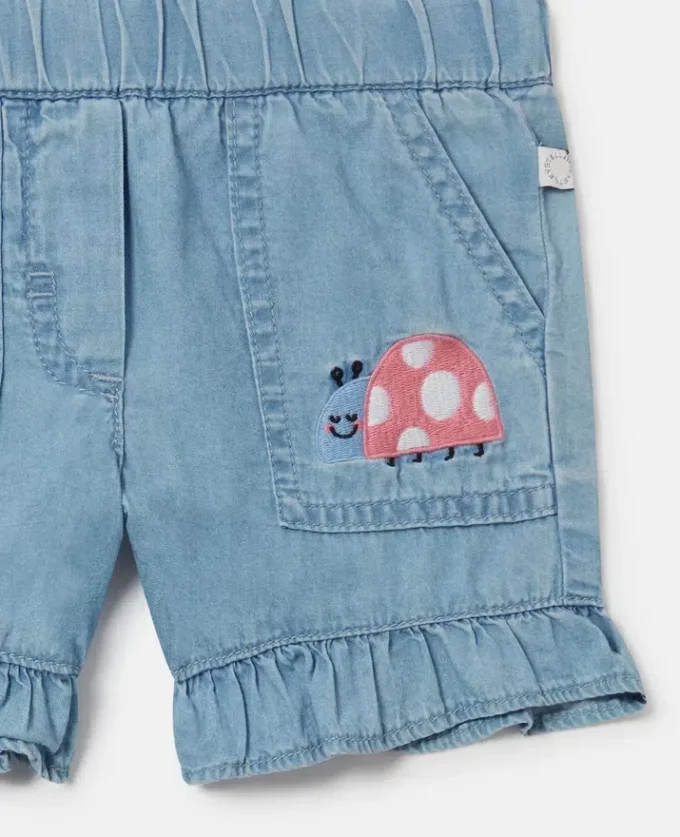 Short en jean brodé de coccinelles Short en jean brodé de coccinelles