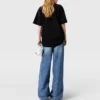 Jean délavé à taille haute et jambes larges Jean délavé à taille haute et jambes larges