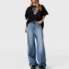 Jean délavé à taille haute et jambes larges Jean délavé à taille haute et jambes larges
