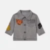 Veste en jean brodée avec motif musical Veste en jean brodée avec motif musical