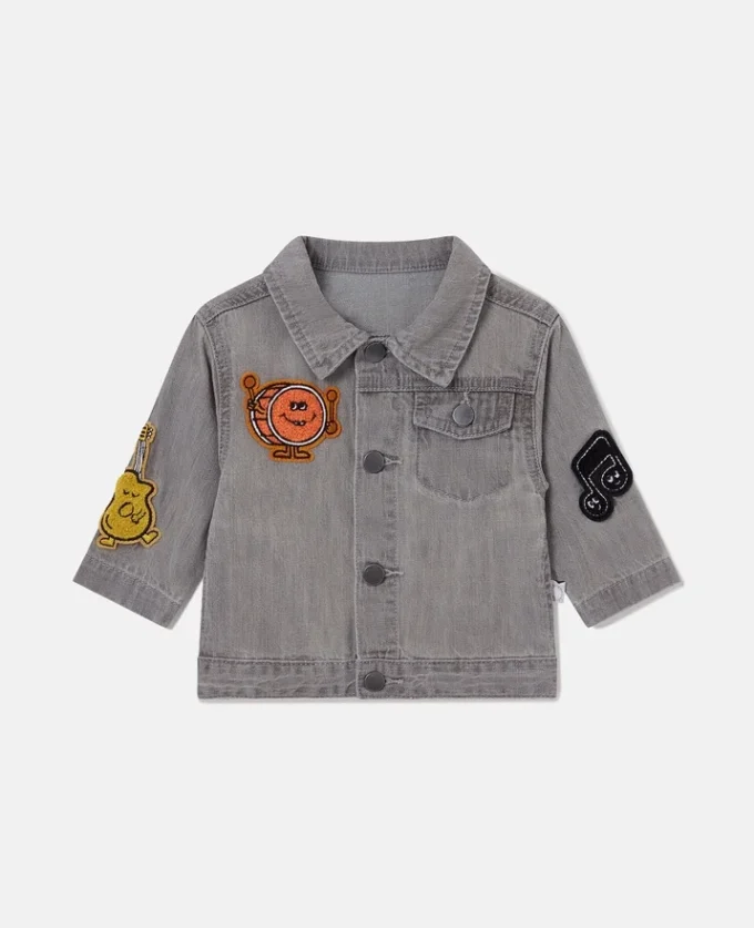 Veste en jean brodée avec motif musical Veste en jean brodée avec motif musical