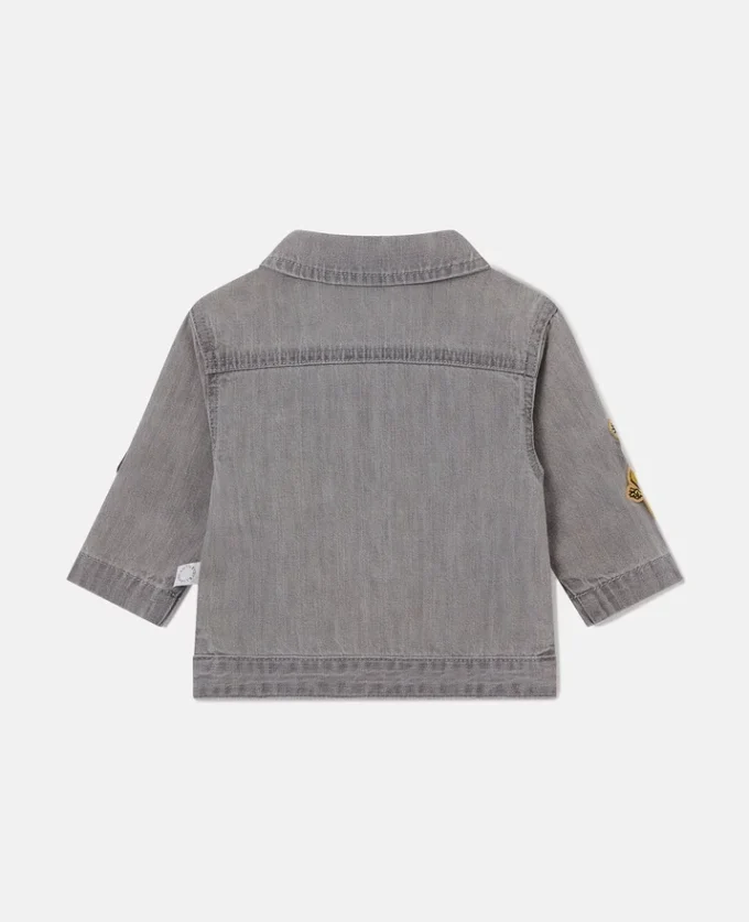 Veste en jean brodée avec motif musical Veste en jean brodée avec motif musical