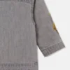 Veste en jean brodée avec motif musical Veste en jean brodée avec motif musical