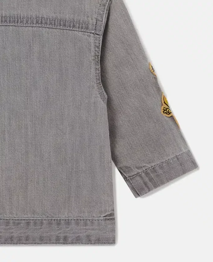 Veste en jean brodée avec motif musical Veste en jean brodée avec motif musical